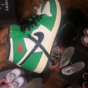 Size 1Y boys retro 1s worn one time you can tell by the bottom of the shoe